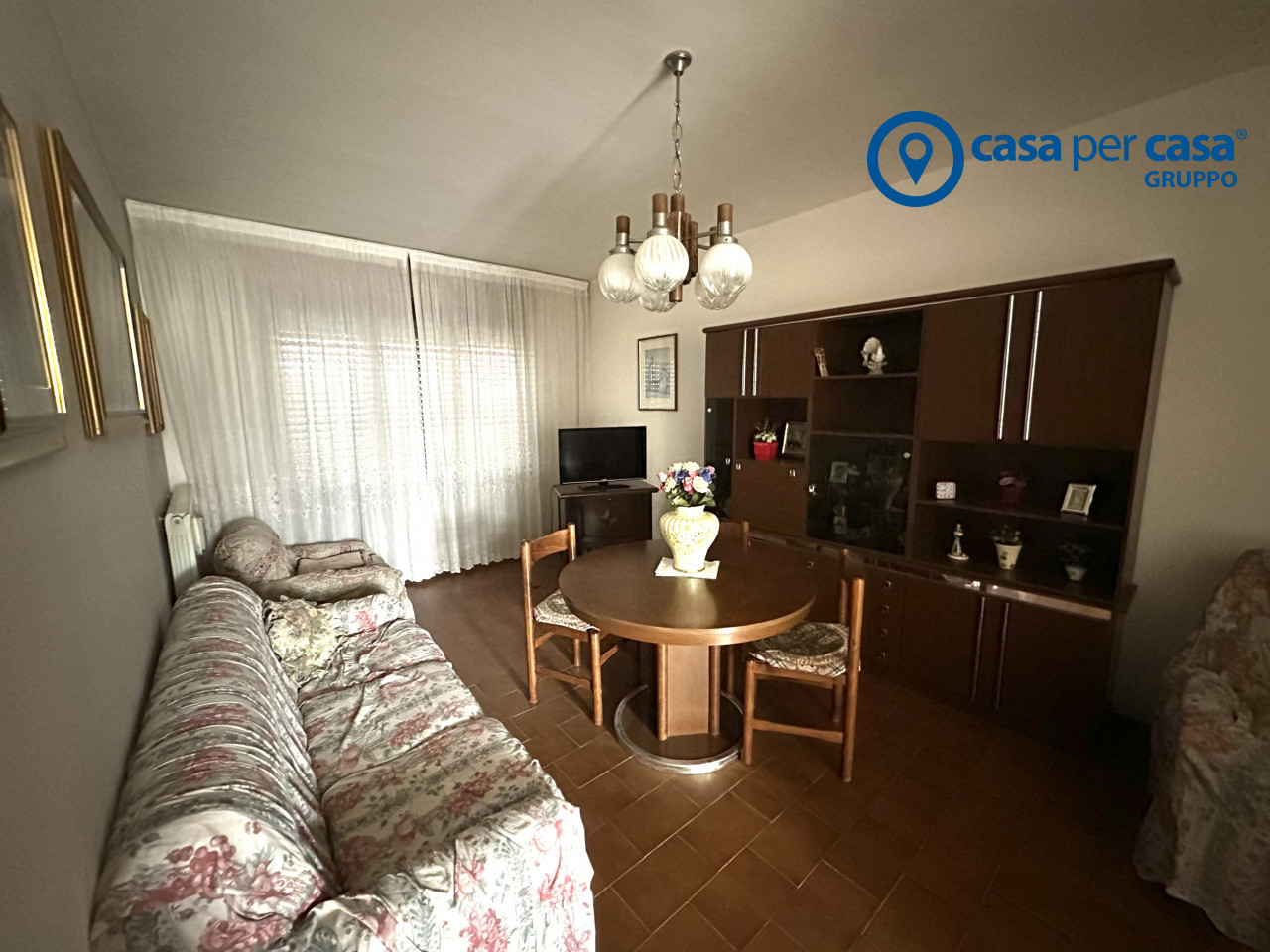 TRILOCALE CON GARAGE, CANTINA E PICCOLO SCOPERTO DI PROPRIETA'